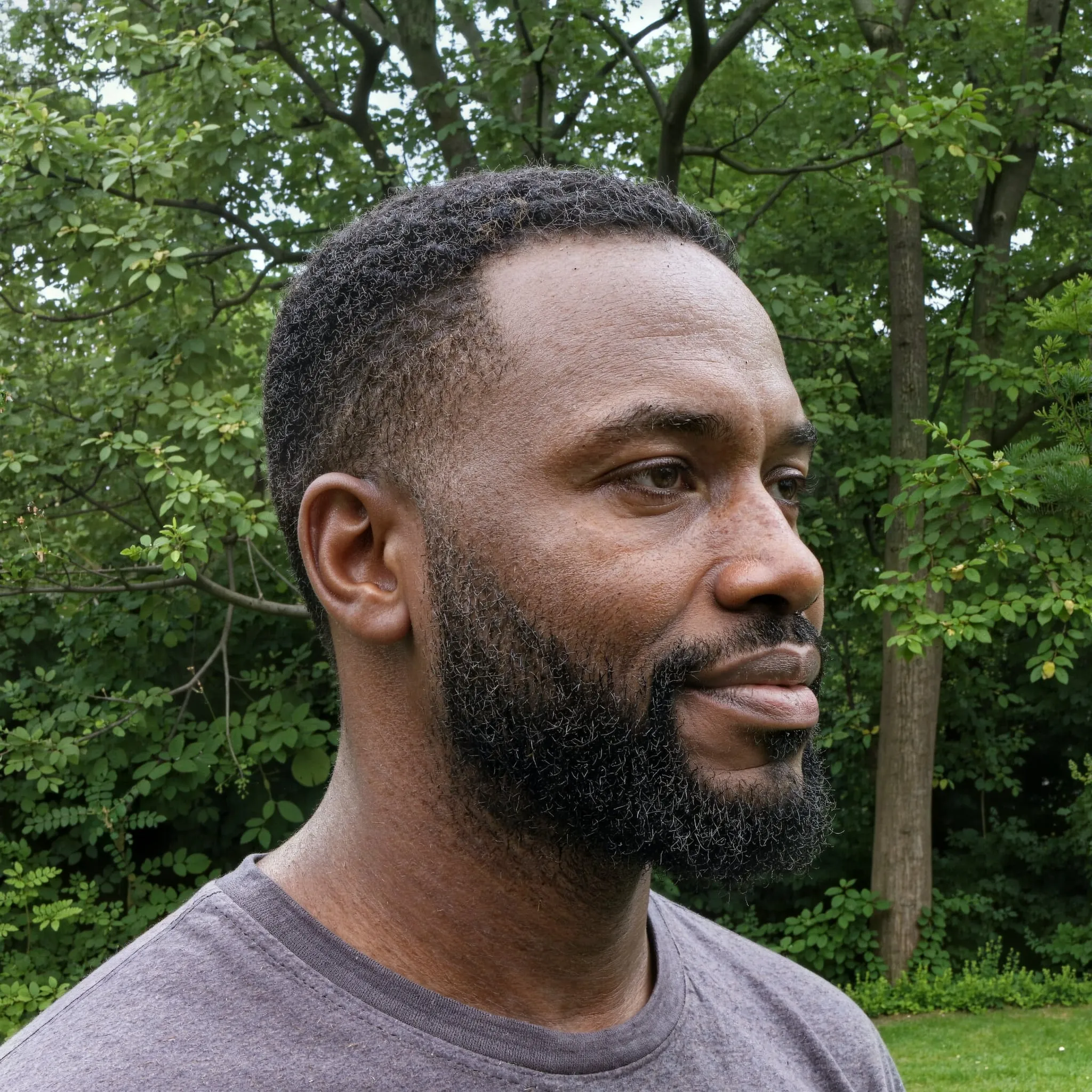 Close-up portrait of an African man, showcasing enhanced skin texture and sharper facial details after upscaling. after enhancement and upscaling