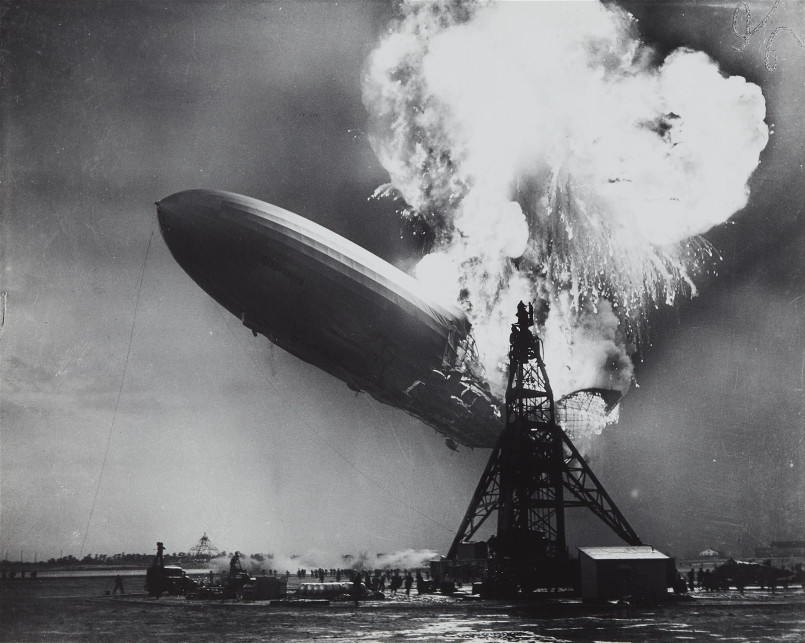 The German airship Hindenburg bursting into flames during its attempt to dock in New Jersey. before enhancement and upscaling